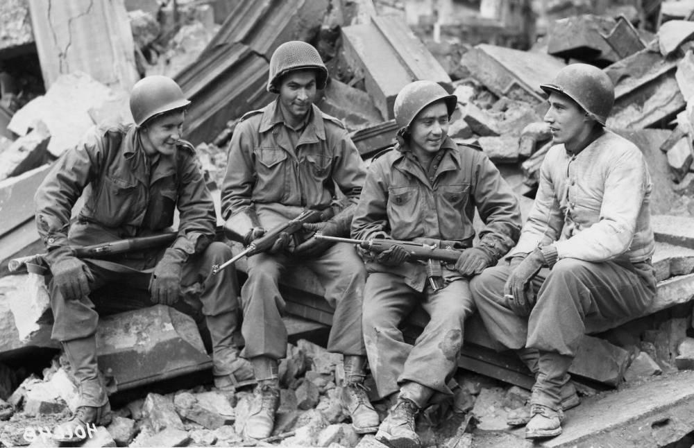 Combat Infantrymen of Company G, 415th Infantry Regiment, 104th Division, are Resting in Rubble, Cologne. March 7, 1945